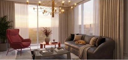 Living room with a grey sofa and burgundy armchair
